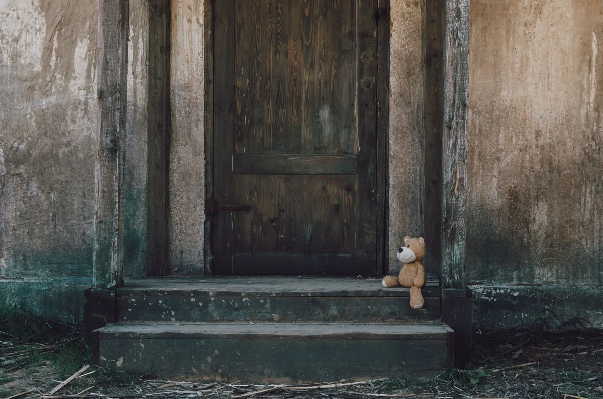 A worn vintage teddy bear