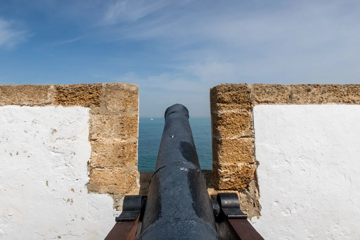 An old stone rampart with a cannon