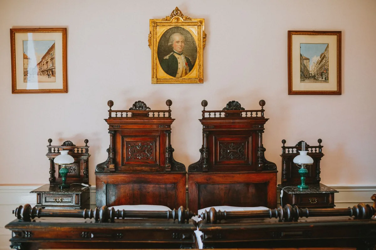 An antique wooden bed frame